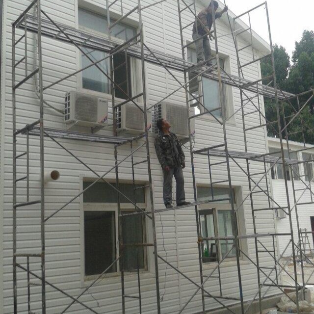 PVC外墙挂板厂家外墙改造快装板仿木纹长条扣板轻钢房屋防水墙板