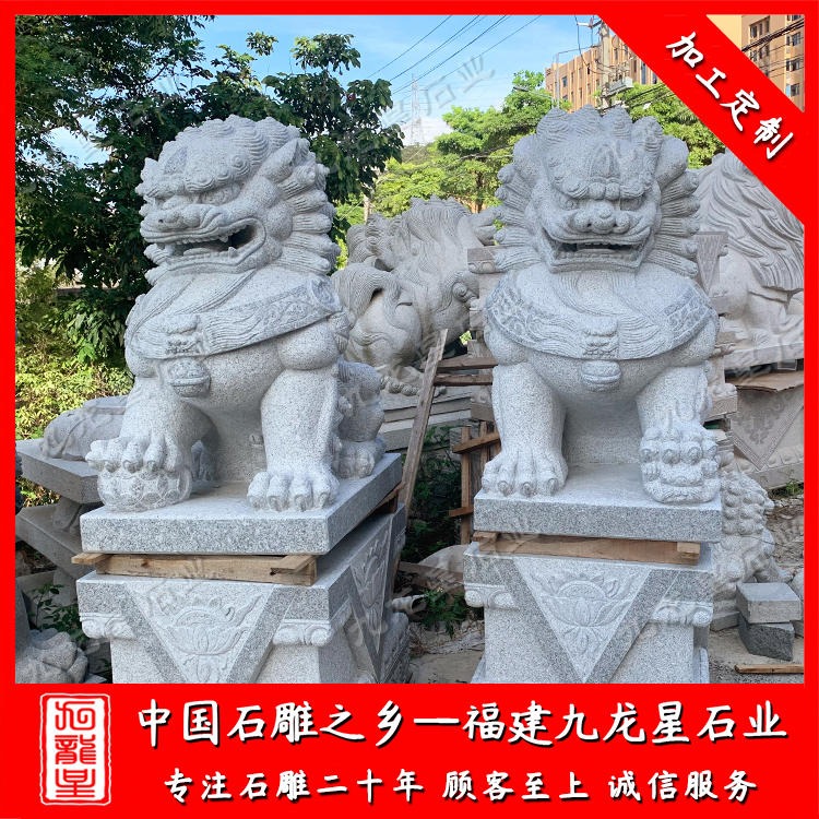 门前石雕狮子摆放 石狮子雕像价格 狮子石雕定做 九龙星石业图片
