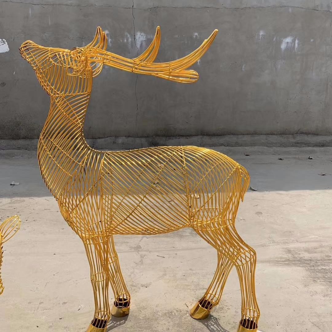 不锈钢丝鹿雕塑    不锈钢鹿雕塑   钢丝编织镂空鹿雕塑定制  永景园林雕塑