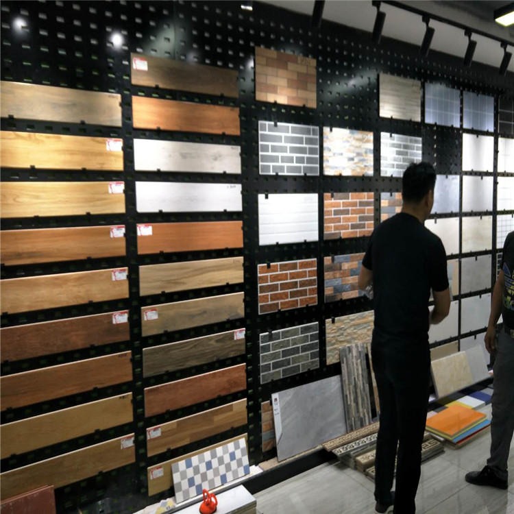 迅鹰方孔展示货架  鄂州瓷砖展示架冲孔板   太原800瓷砖挂板展示架厂家