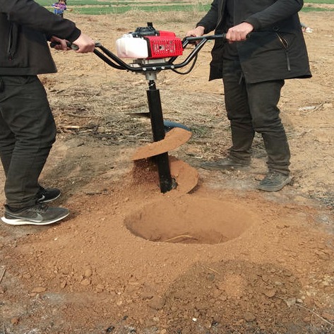 田地使用捷亚钻树窝机打眼  小型土地钻动力足   种树打洞机钻挖深度图片