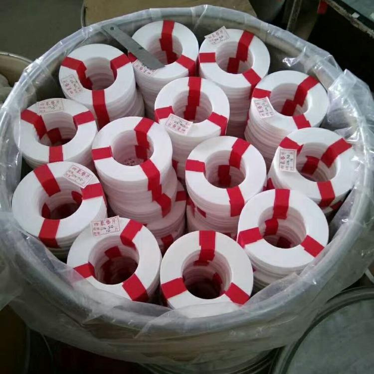 大连纯料石棉包覆橡胶垫片一公斤价格 加工定制异型四氟垫片 四氟橡胶垫片厂家直供图片