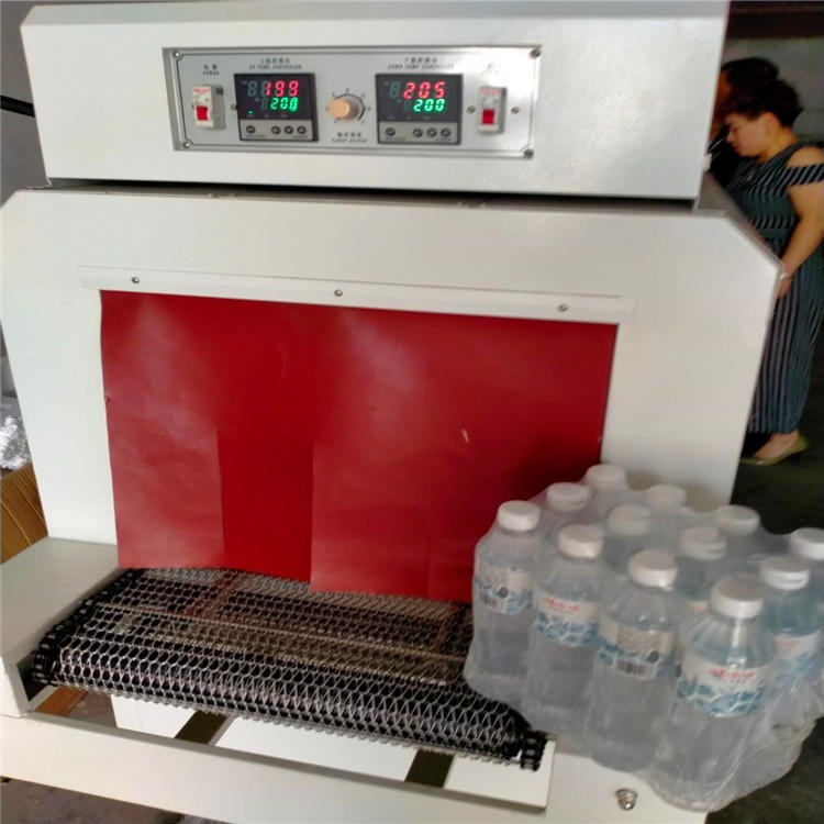 供应水产品PE膜包装机  沃发不锈钢加热款塑包机