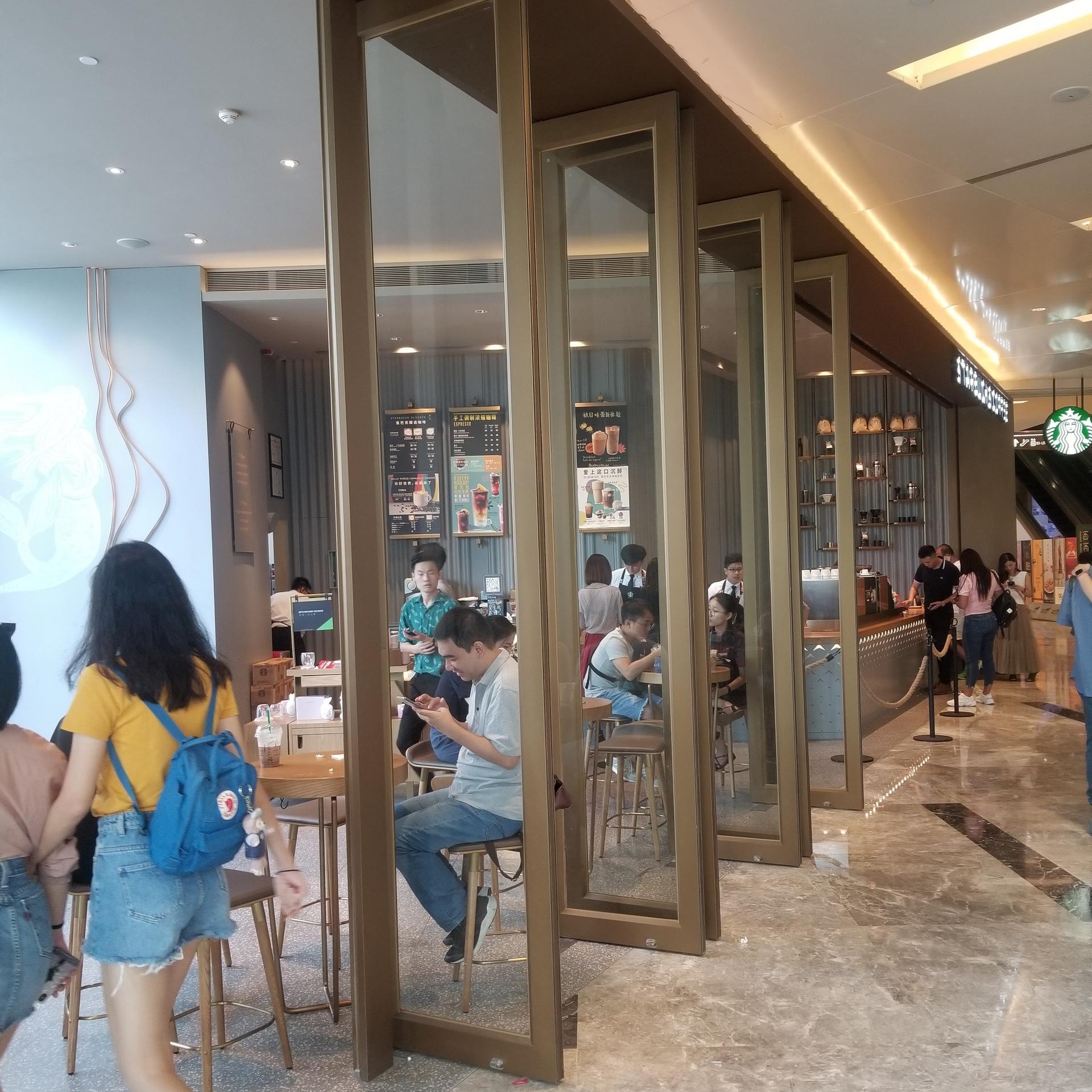 金玛龙中轴门 360度玻璃中轴旋转门 广州万菱广场星巴克案例