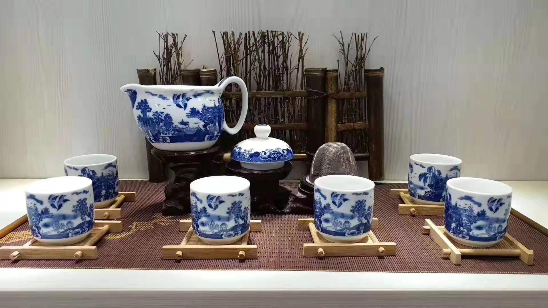 日用陶瓷茶具厂 套装窑变雕刻茶杯 7头青花瓷家用过滤茶具茶杯 陶瓷套装定制logo